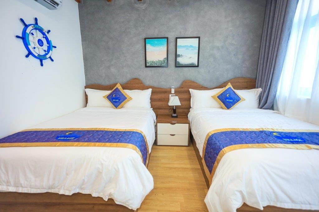 Deluxe Twin Room with Sea View - Khách Sạn Chài Village