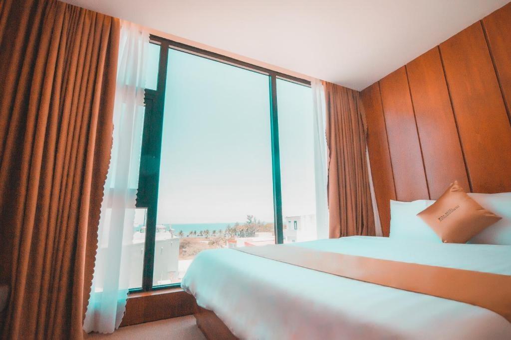 Deluxe 2 Double Beds Room - Khách sạn Mira Quy Nhơn