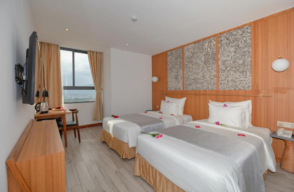 Deluxe Double or Twin Room - Khách Sạn Majestic Premium Nha Trang