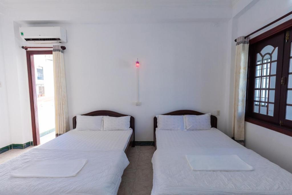 Phòng Tiêu Chuẩn 2 Giường Đơn - Khách Sạn Thái Bình