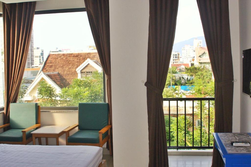 Deluxe Triple Room - Marigold Hotel & Apartment