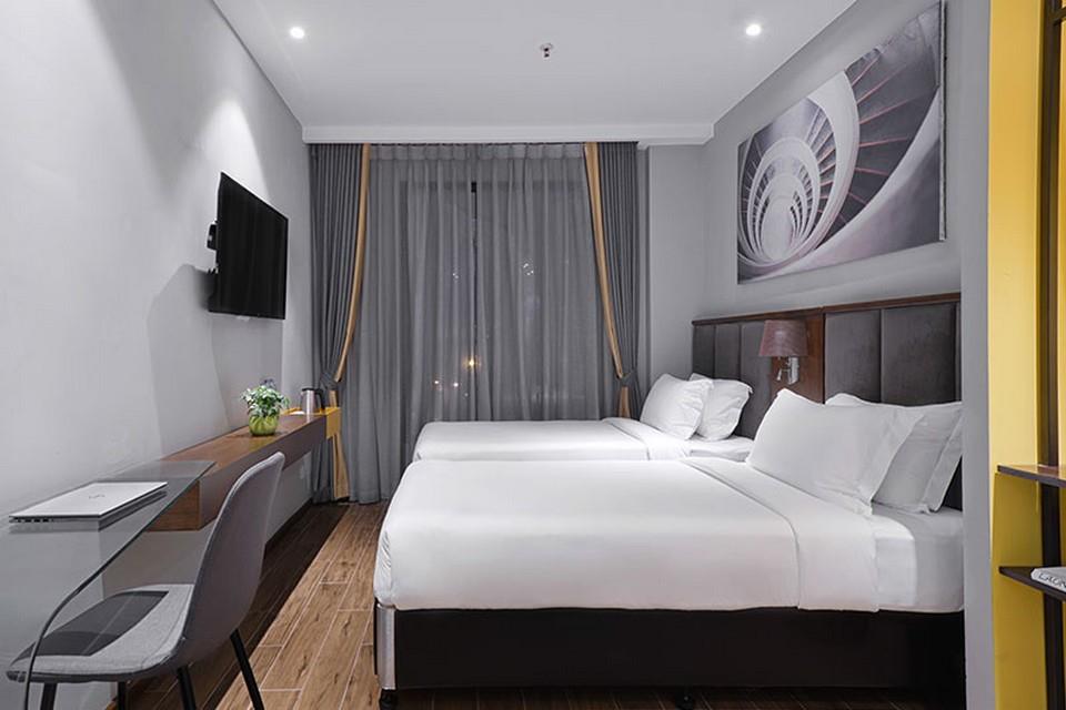Phòng Deluxe 2 Giường Đơn Hướng Phố - Khách Sạn Grand Cititel Hà Nội 