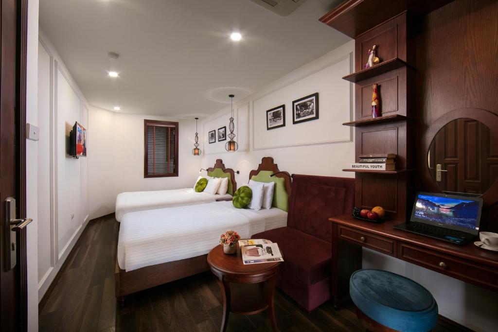 Phòng Deluxe Giường Đôi/2 Giường Đơn - Khách Sạn Vision Premier