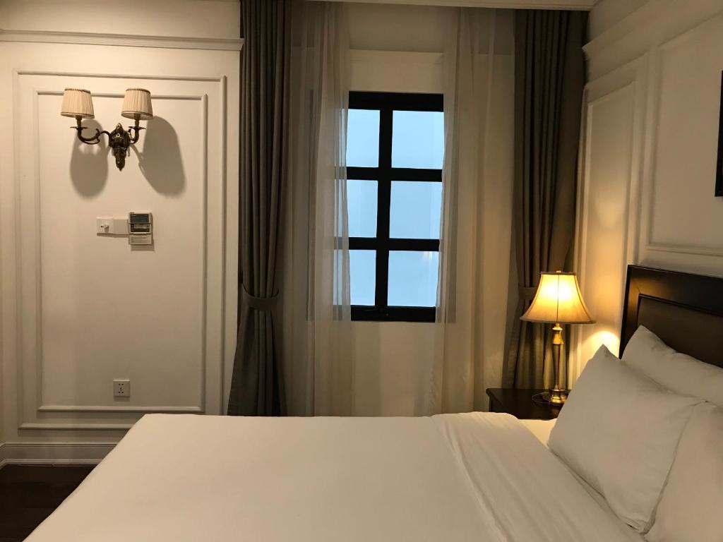 Phòng Superior giường đôi/ 2 giường đôi cửa sổ giếng trời - Hotel Du Monde