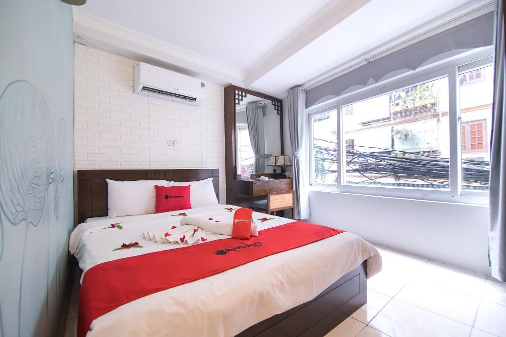 Phòng Deluxe - Khách Sạn Rendezvous Boutique