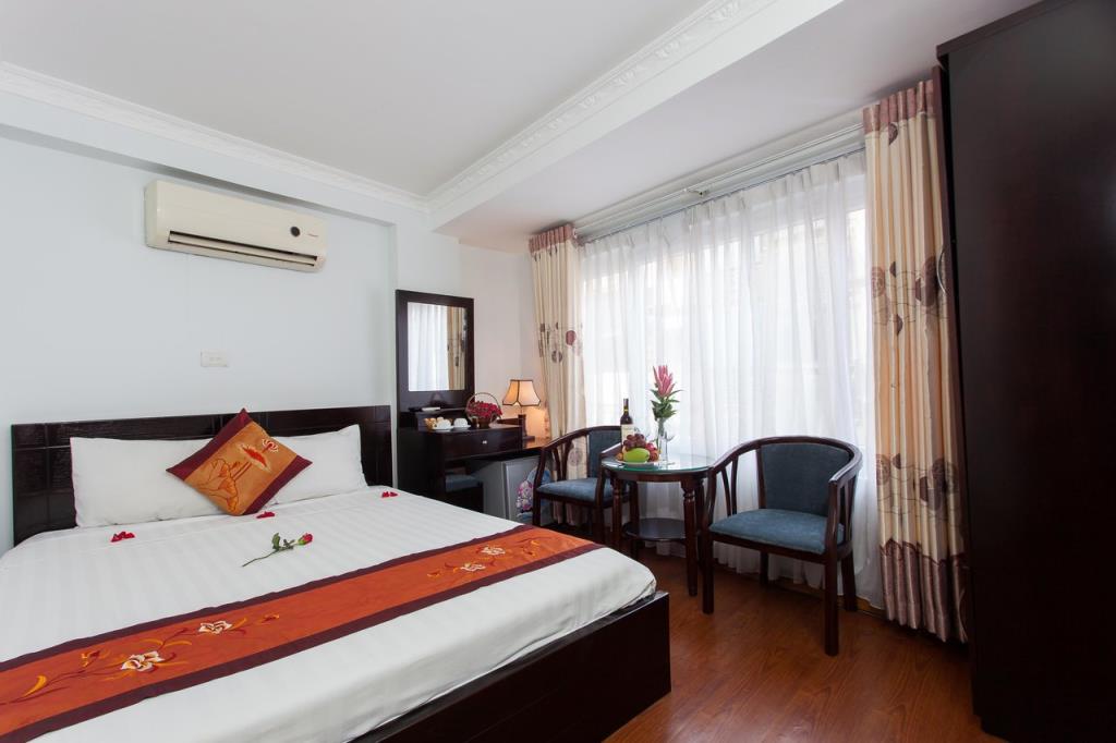 Phòng Deluxe - Khách Sạn Rendezvous Boutique