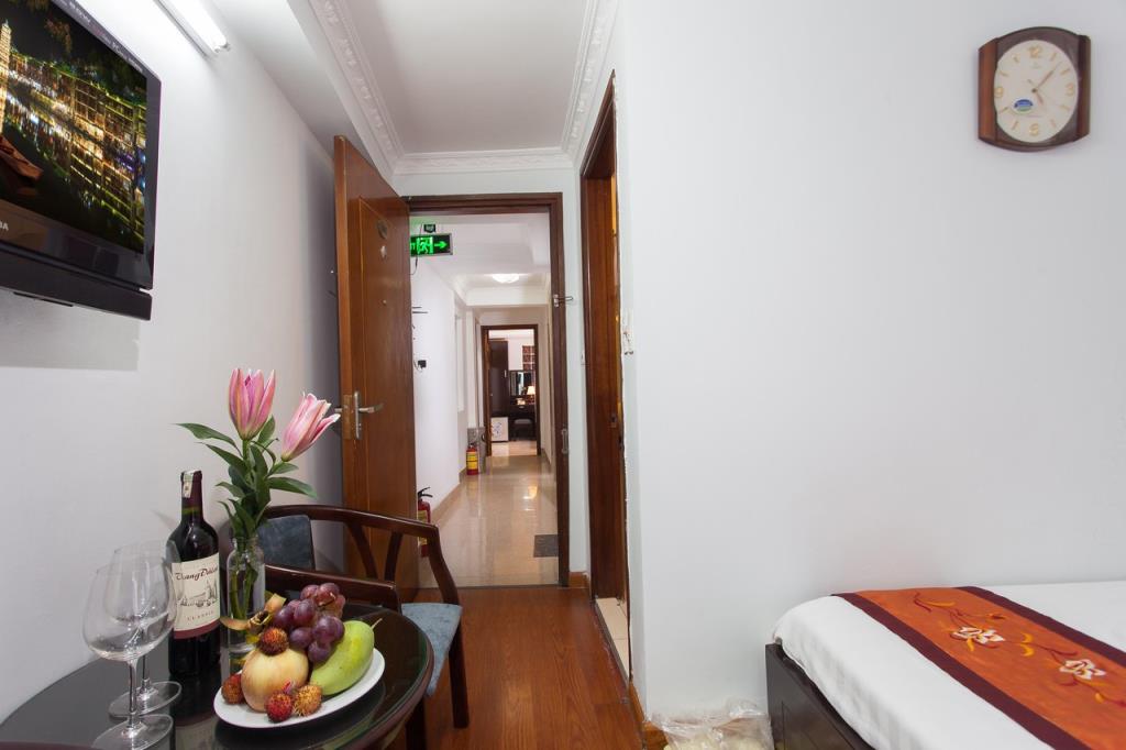 Phòng Deluxe - Khách Sạn Rendezvous Boutique