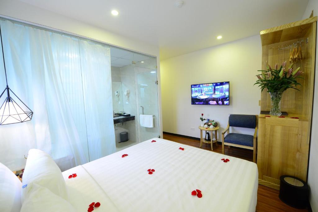 Phòng Deluxe Giường Đôi - Blue Hà Nội Inn Luxury Hotel & Spa (Blue Hanoi Inn Group)