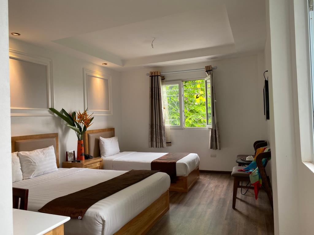 Deluxe Double or Twin Room - Khách sạn Holiday Suites Hotel & Spa