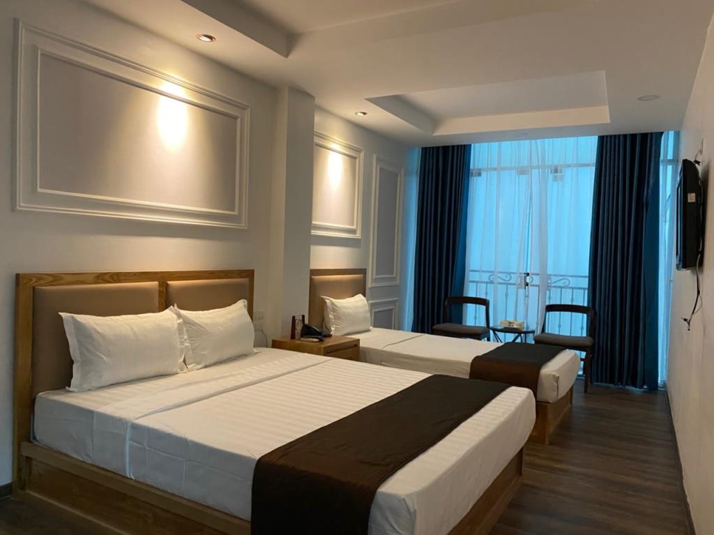 Deluxe Family 3 people - Khách sạn Holiday Suites Hotel & Spa