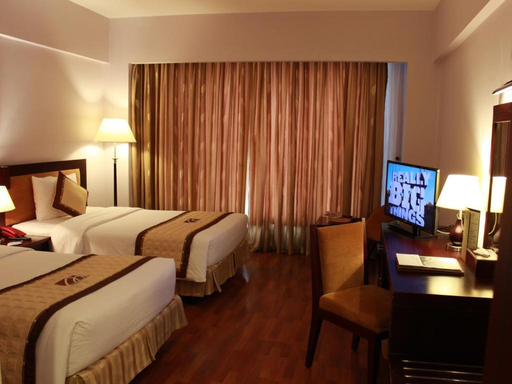 Deluxe City View - Khách Sạn Mondial Huế