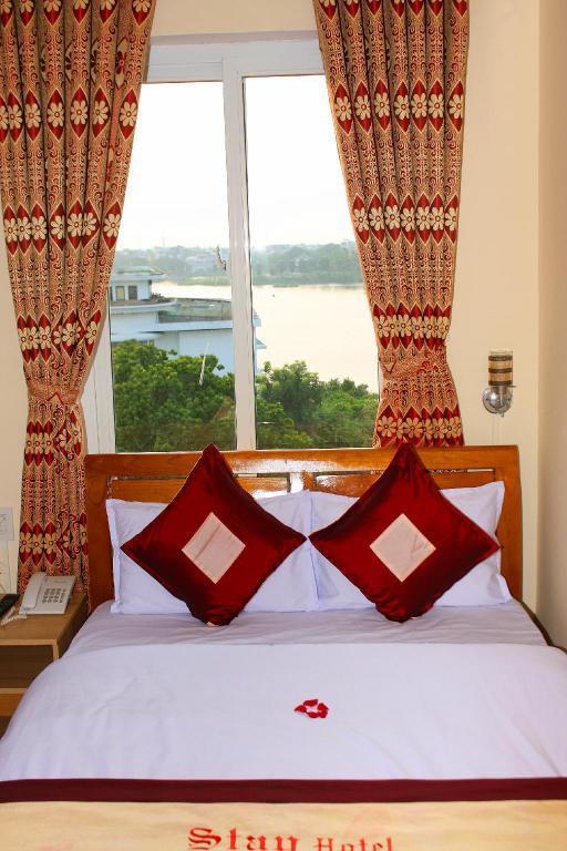 Phòng Superior Triple with City or Garden view - Khách Sạn Stay Huế