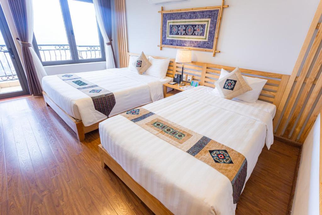 Phòng Deluxe 1 Giường Lớn hoặc 2 Giường Đơn Hướng Núi - Sapa Highland Resort