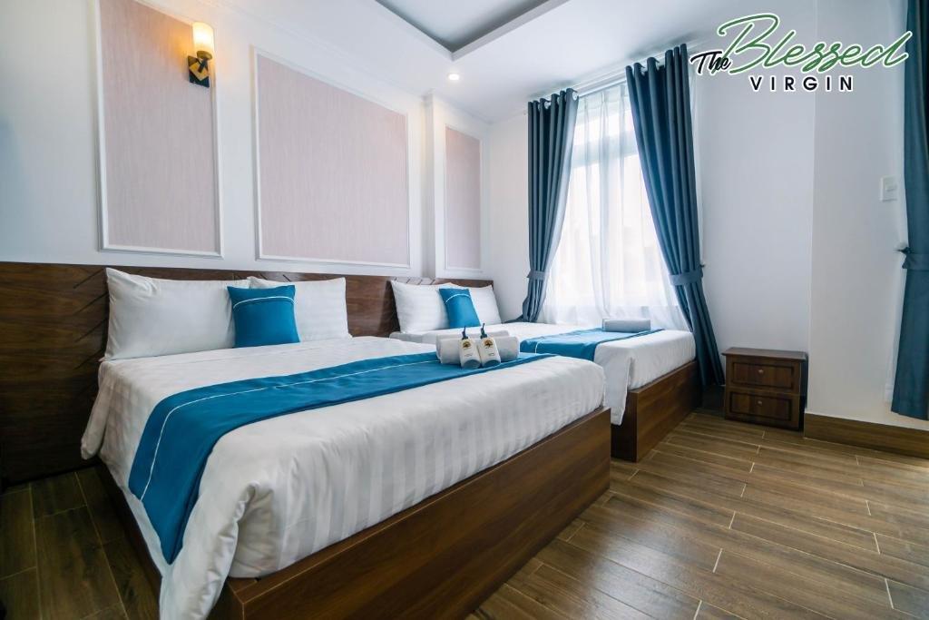 Grand Deluxe Family City View With Balcony Room - Khách Sạn Hodota The Blessed Virgin