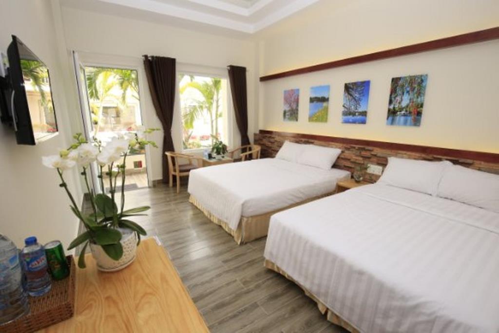 Quad Room - Khách Sạn TUK