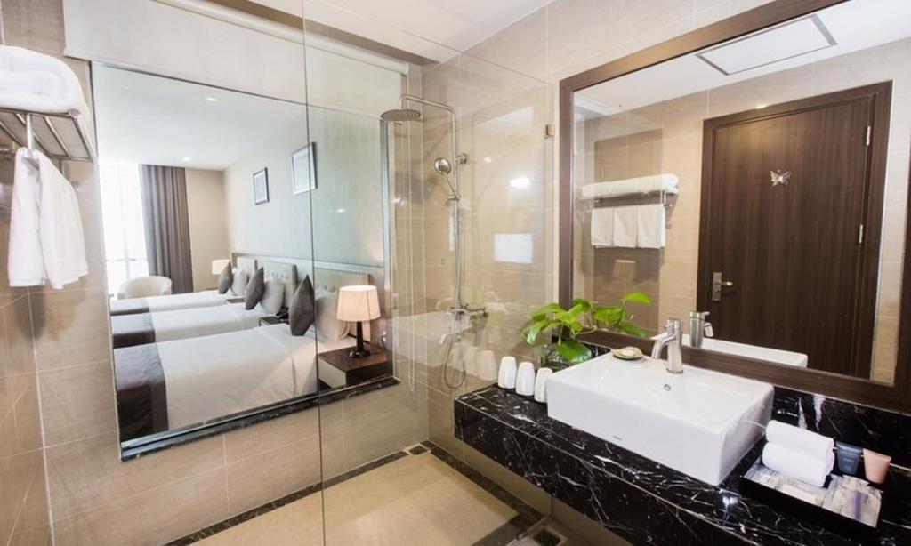 Phòng Deluxe 3 Giường Đơn - Khách Sạn Mường Thanh Grand Hoàng Mai