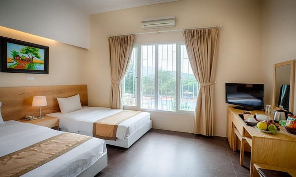 Phòng 2 Giường Đơn Hướng Hồ Bơi - Khu Sư Tử - VResort Hòa Bình