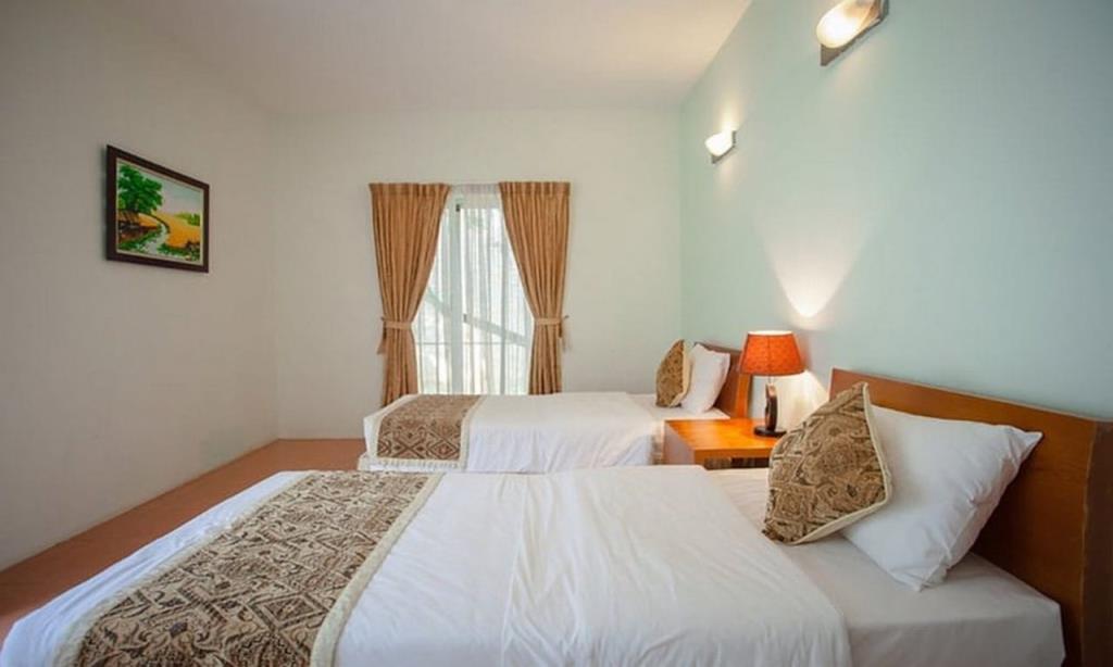 Villa Hoa Hoàng Lan 1 Giường Lớn Và 2 Giường Đơn - VResort Hòa Bình