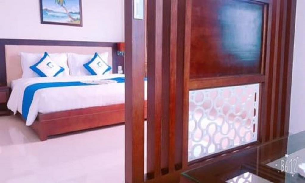 Phòng Deluxe 2 Giường Lớn Hướng Phố - Khách Sạn Blue Wave Cửa Lò
