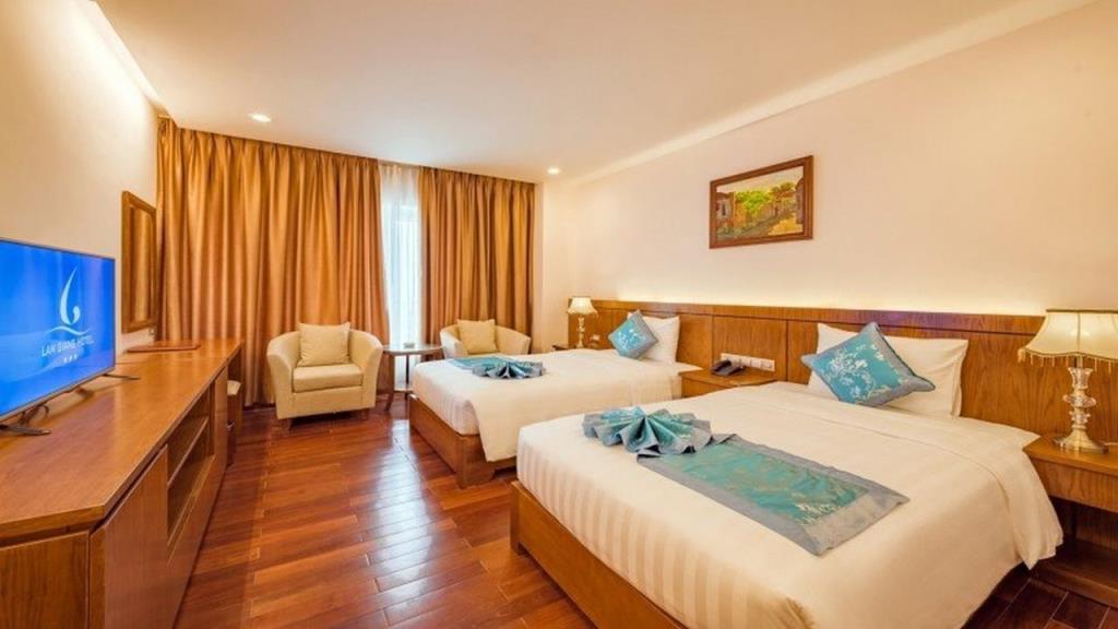 Phòng Suite 1 Giường Lớn Hướng Phố - Khách Sạn Lam Giang