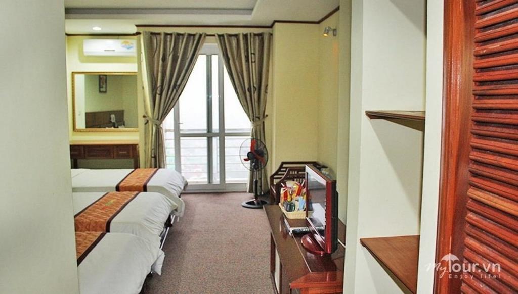Phòng Deluxe 1 Giường Lớn Và 1 Giường Đơn Hướng Phố - Khách Sạn Beijing