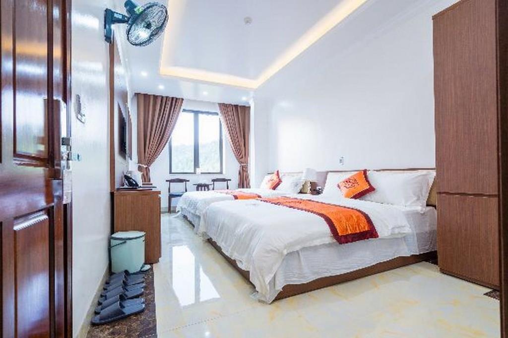 Phòng Deluxe 2 Giường Đơn - Khách Sạn Đinh Gia Hà Giang