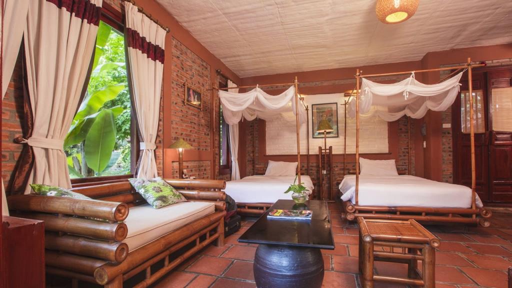 Phòng Deluxe 1 Giường Lớn - Vạn Chài Resort