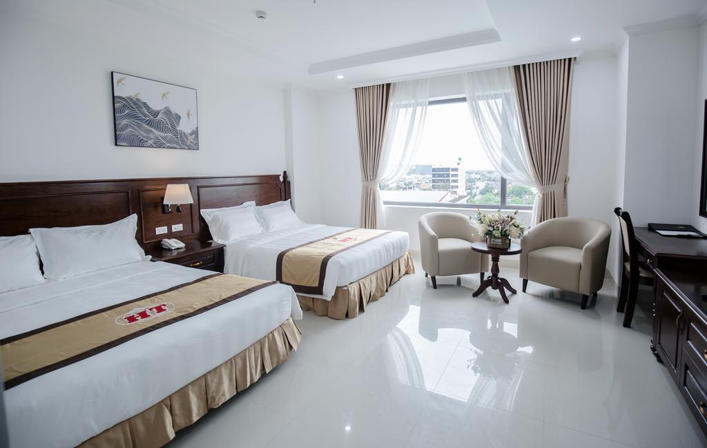 Phòng Deluxe 2 Giường Lớn Hướng Phố - Khách Sạn Hoàng Thái Sầm Sơn