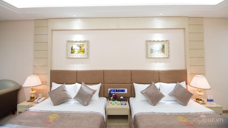 Deluxe Connecting 4 Người - Khách sạn Holiday One