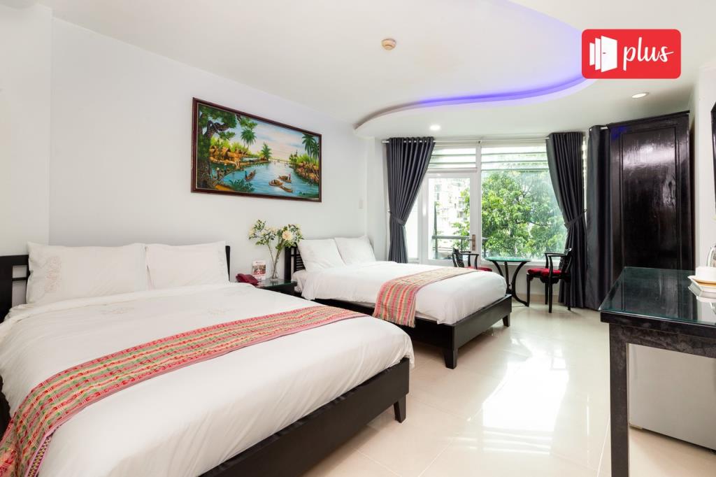 RedDoorz Deluxe Twin Room - RedDoorz Saigon Pink Hotel Ho Tung Mau