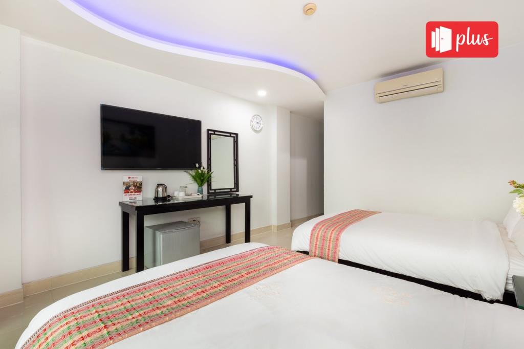 RedDoorz Deluxe Twin Room - RedDoorz Saigon Pink Hotel Ho Tung Mau