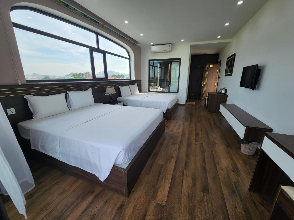 Phòng 2 giường (1m5 + 1m2), - Lotus Hotel Ninh Bình